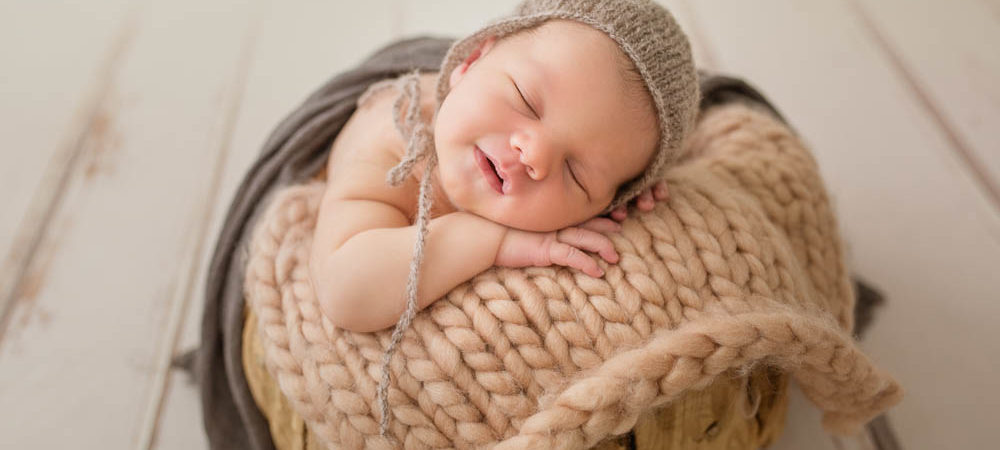 Fotografía de recien nacido en Sevilla. Newborn bebe de 7 días.